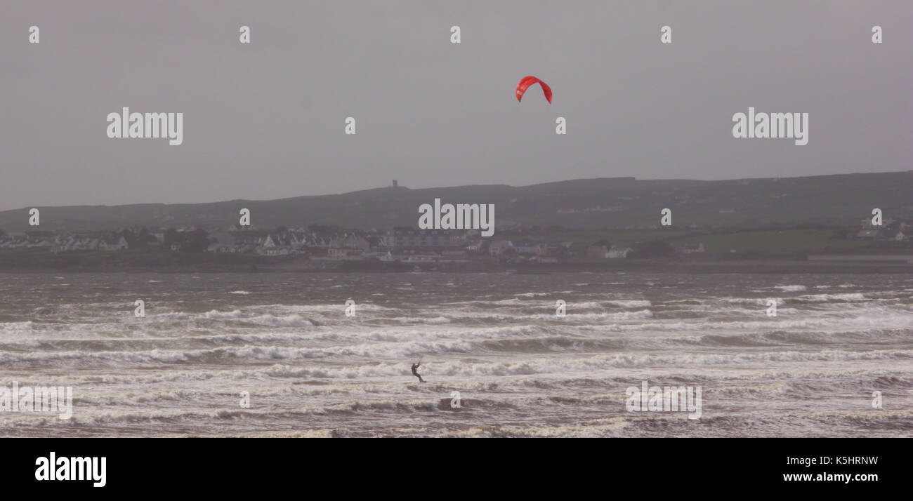 The storm approaches. Beach activity along the West coast of Ireland before the storm and wild weather arrives. Stock Photo