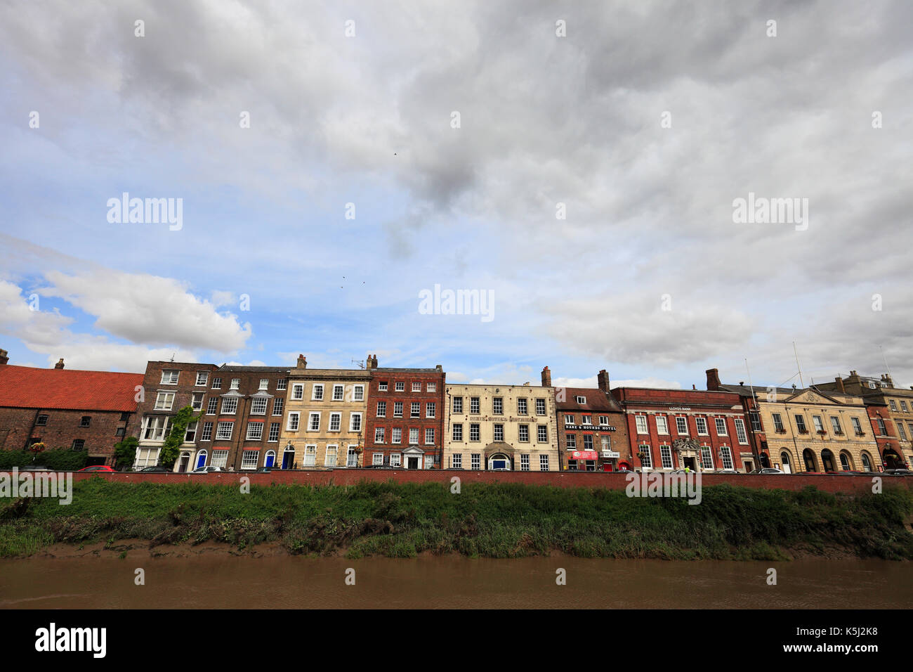 North Brink along the River Nene in the centre of Wisbech, Cambridgeshire, England, UK. Stock Photo