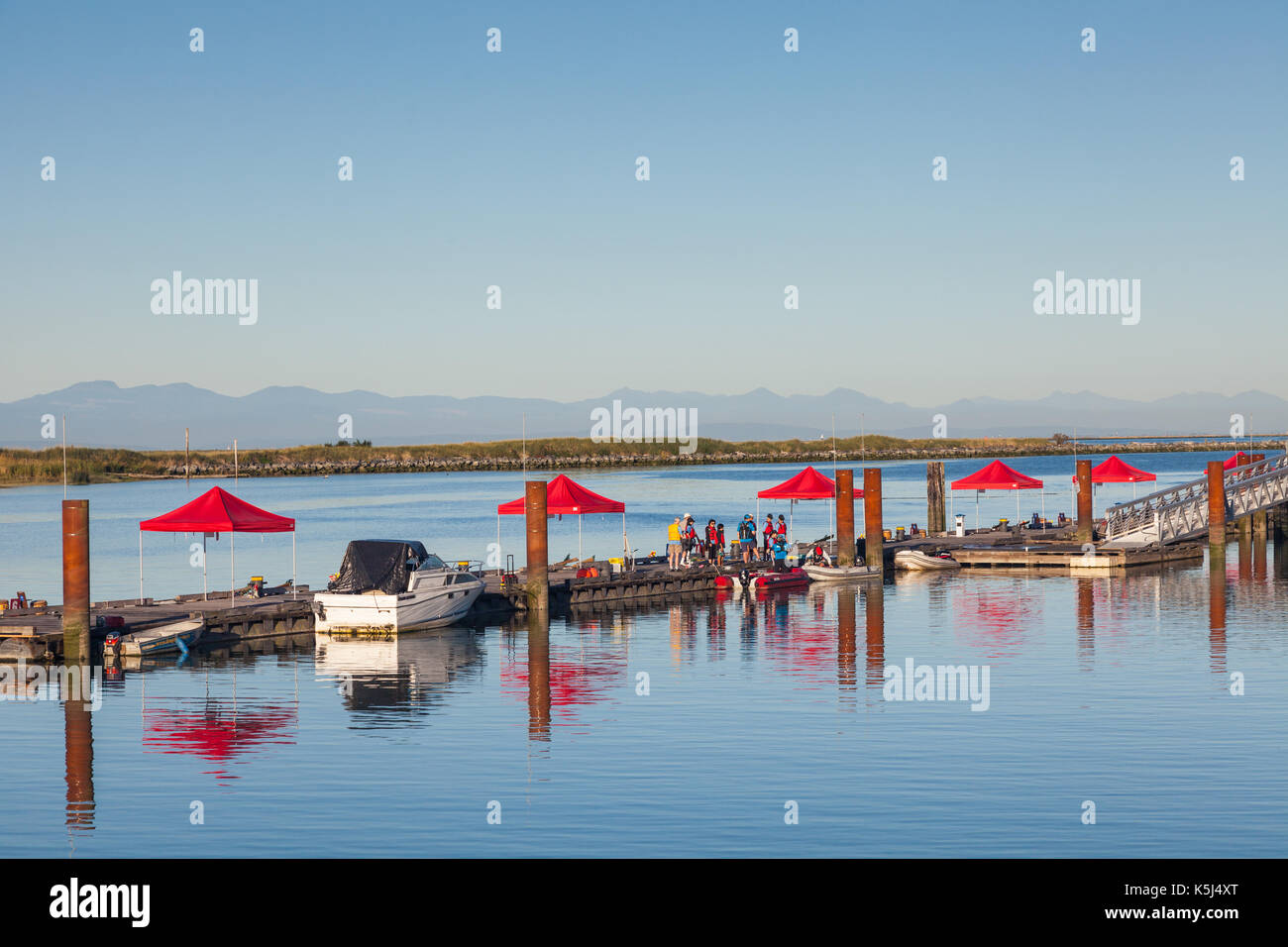 Early morning at Steveston waiting for Dragon Boat paddlers to arrive Stock Photo