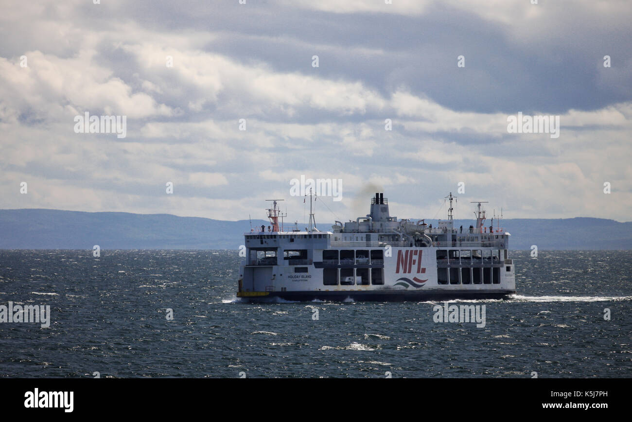 The MV Holiday Island of the Northumberland Ferries Limited is seen crossing the Northumberland Straight between Nova Scotia and Prince Edward Island. Stock Photo