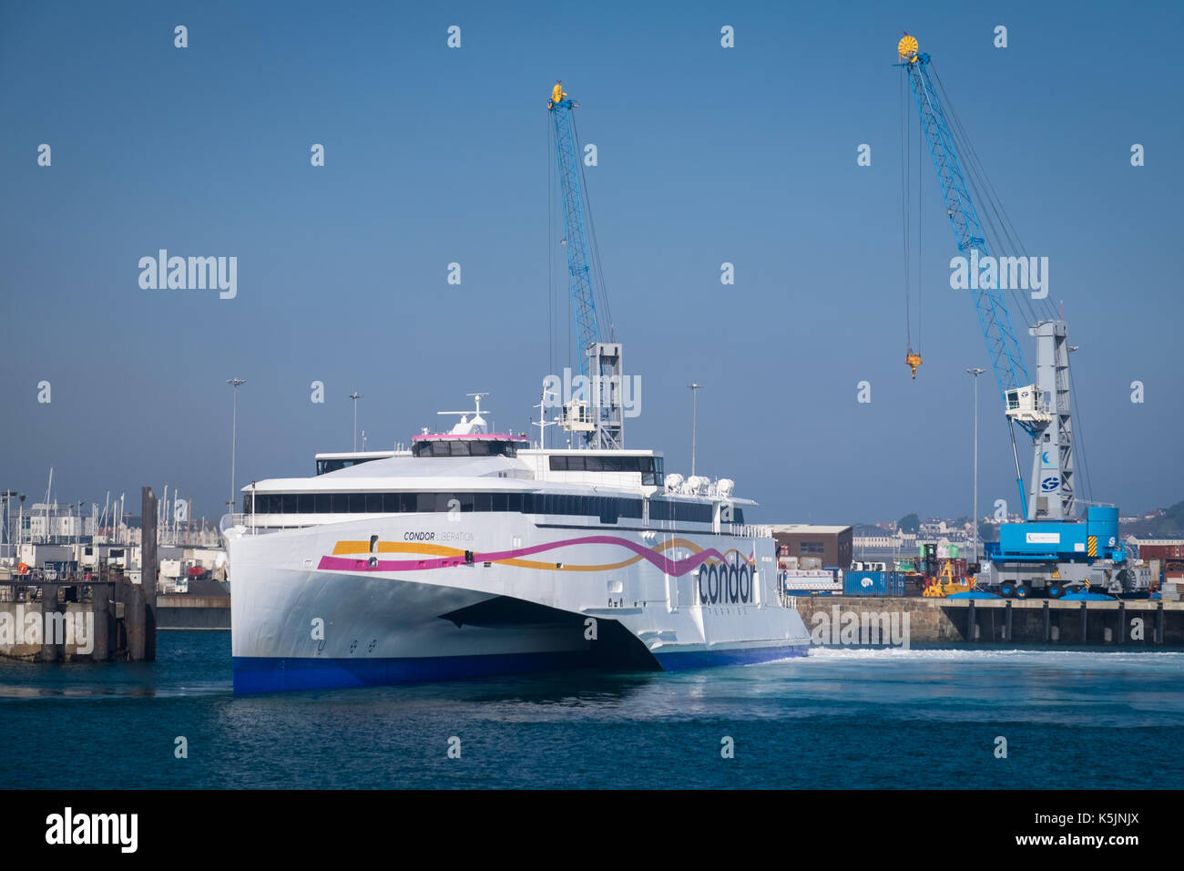 A view of the cross channel ferry, Condor Liberation in St Peter Port in Guernsey, Channel Islands Stock Photo