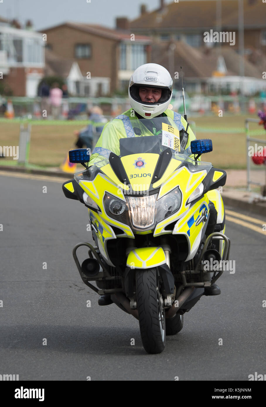 Police motor cycle escort rider at Clacton, Tour of Britain cycle race, 2017. Stock Photo