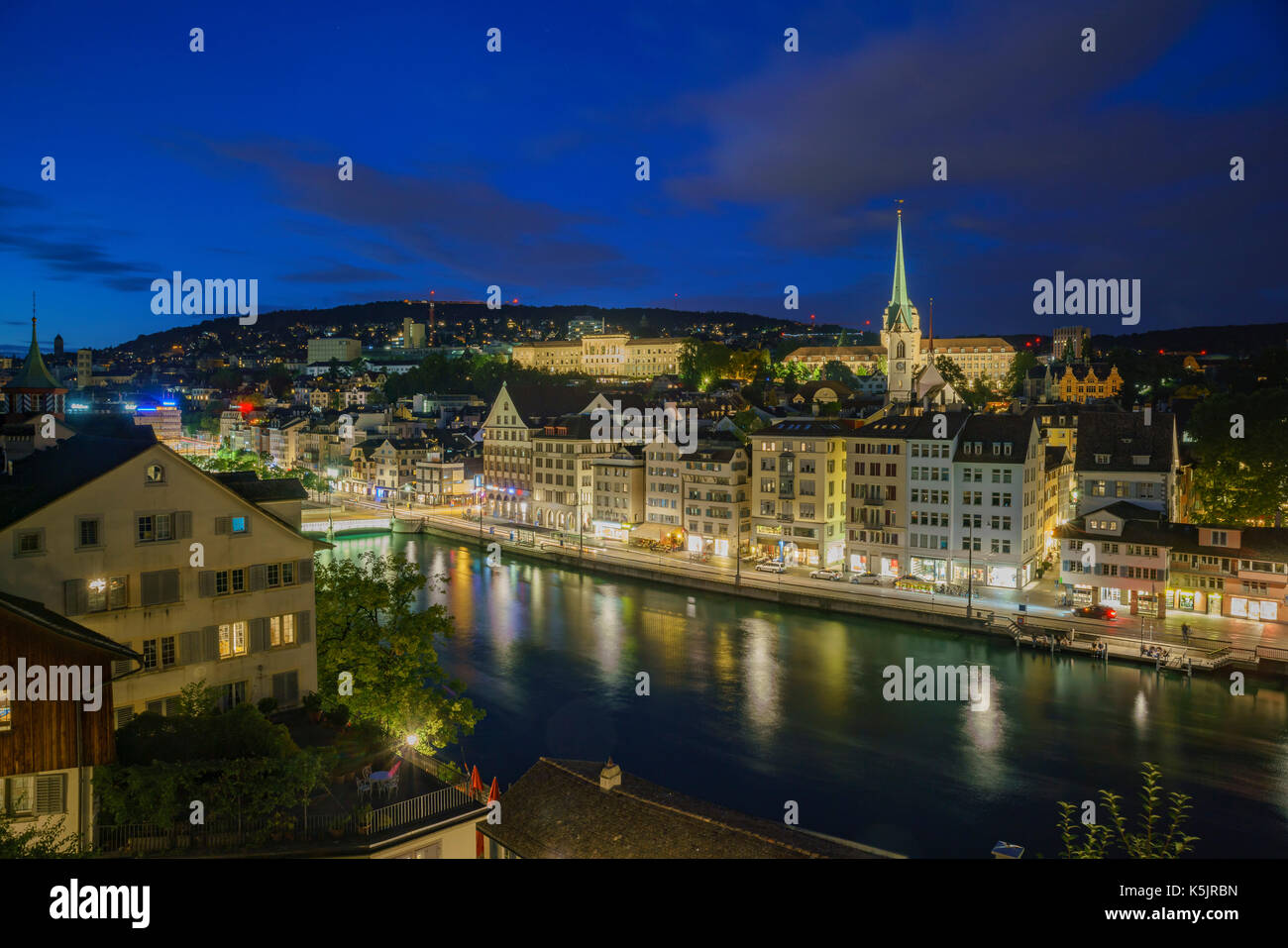 Aerial night cityscape with Limmat river of the historical Zurich city, Switzerland Stock Photo