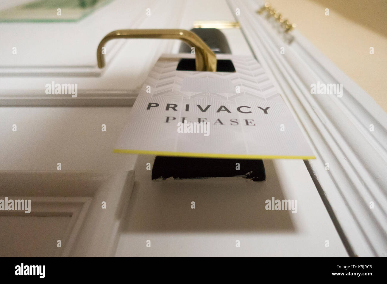 Close up of Privacy sign showing privacy please on the outside of a hotel door at well known chain of hotels Marriot Hotel, Egland, UK Stock Photo