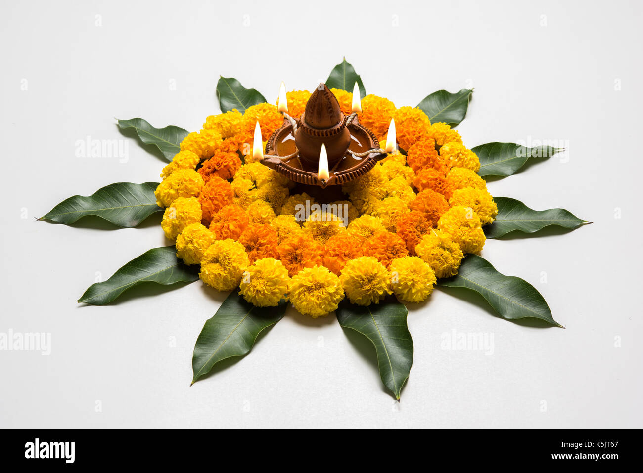 flower rangoli for Diwali or pongal or onam made using marigold or ...