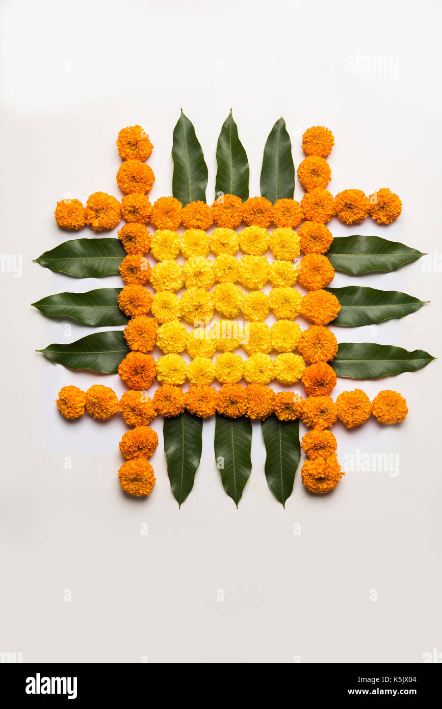 flower rangoli for Diwali or pongal or onam made using marigold or ...