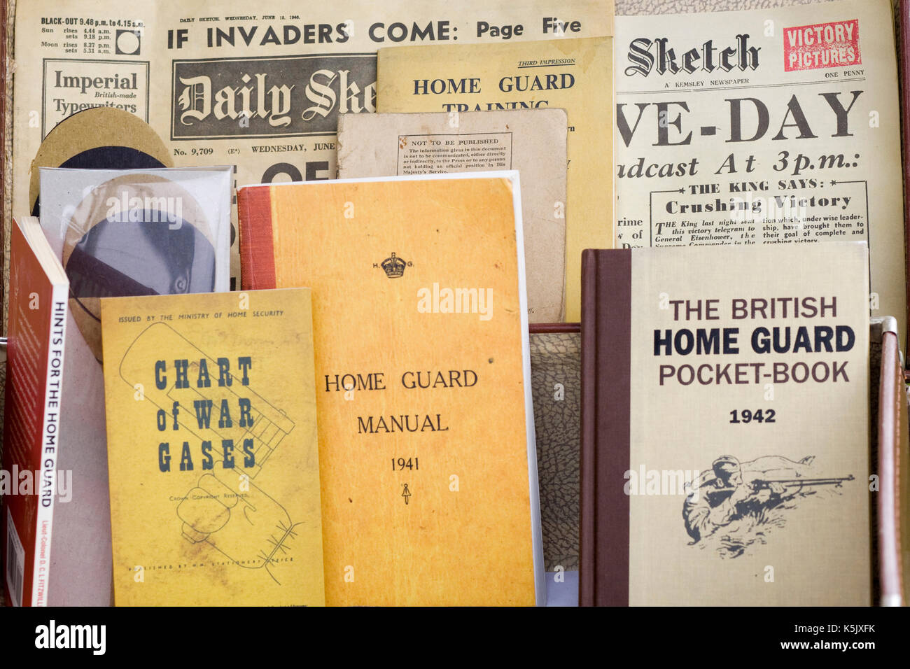 newspapers and homeguard manuals on display at the vicotry show Stock Photo