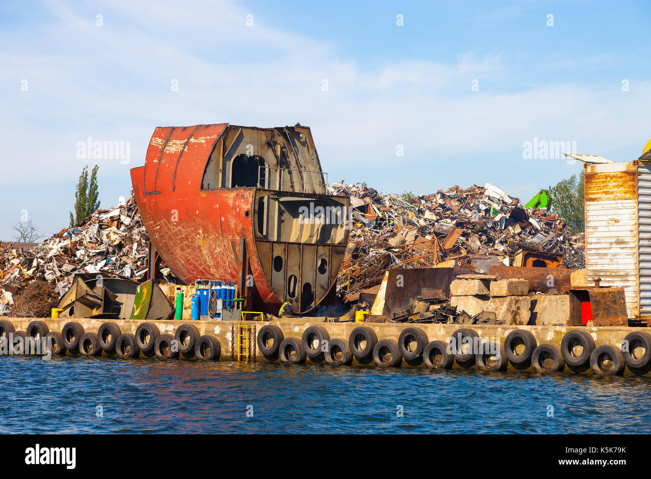 Dismantling the ship on scrap metal ready for recycling. Stock Photo