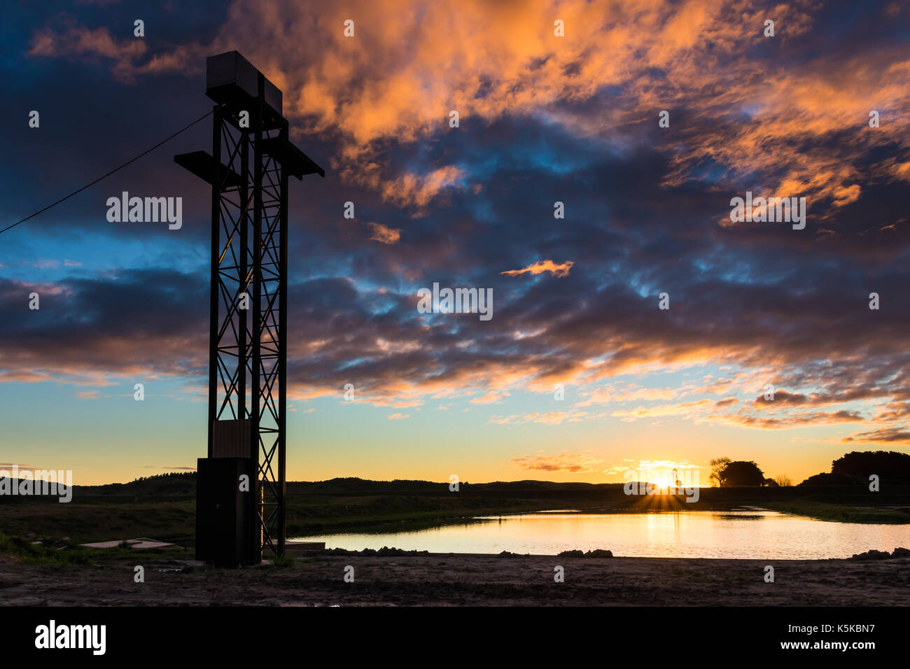 Foxton New Zealand new water park, showing it's new cable towers. With a wonderful sunset sky. Stock Photo