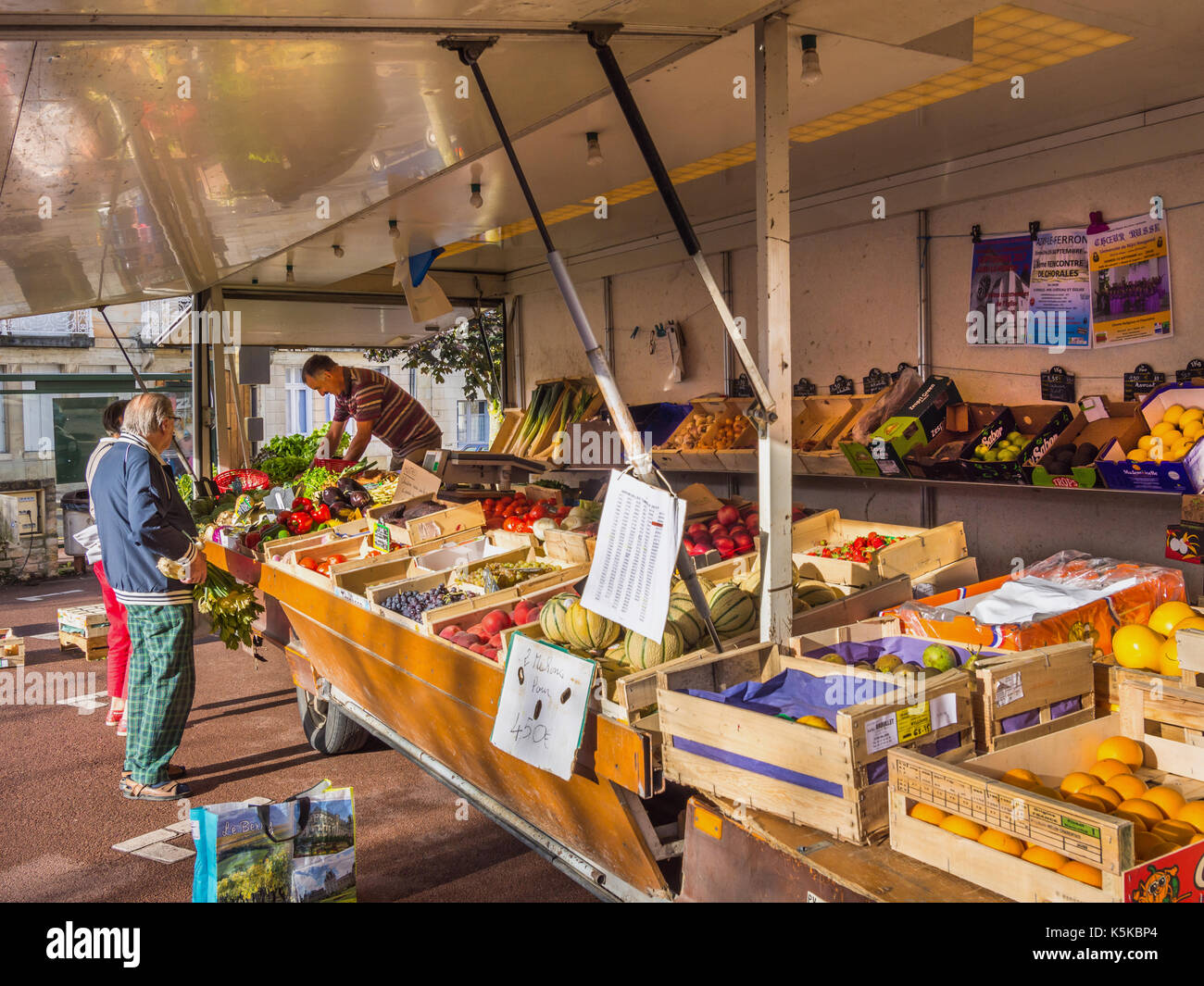 Open-sided vegetable lorry on market day, Preuilly-sur-Claise, France. Stock Photo
