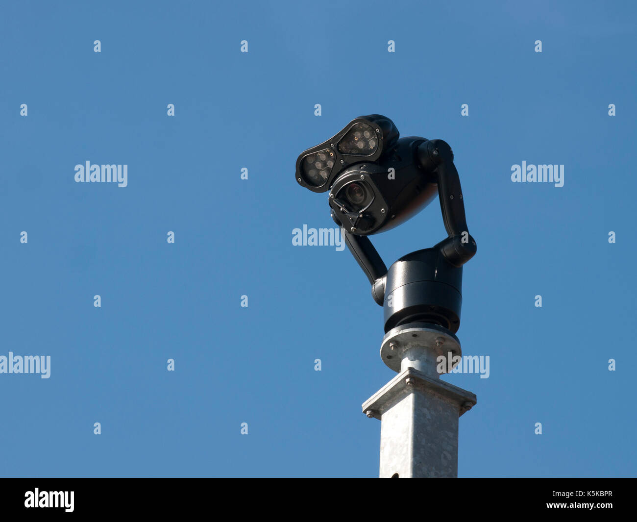 Security Camera in Barnstaple, Devon, set against a blue sky Stock Photo