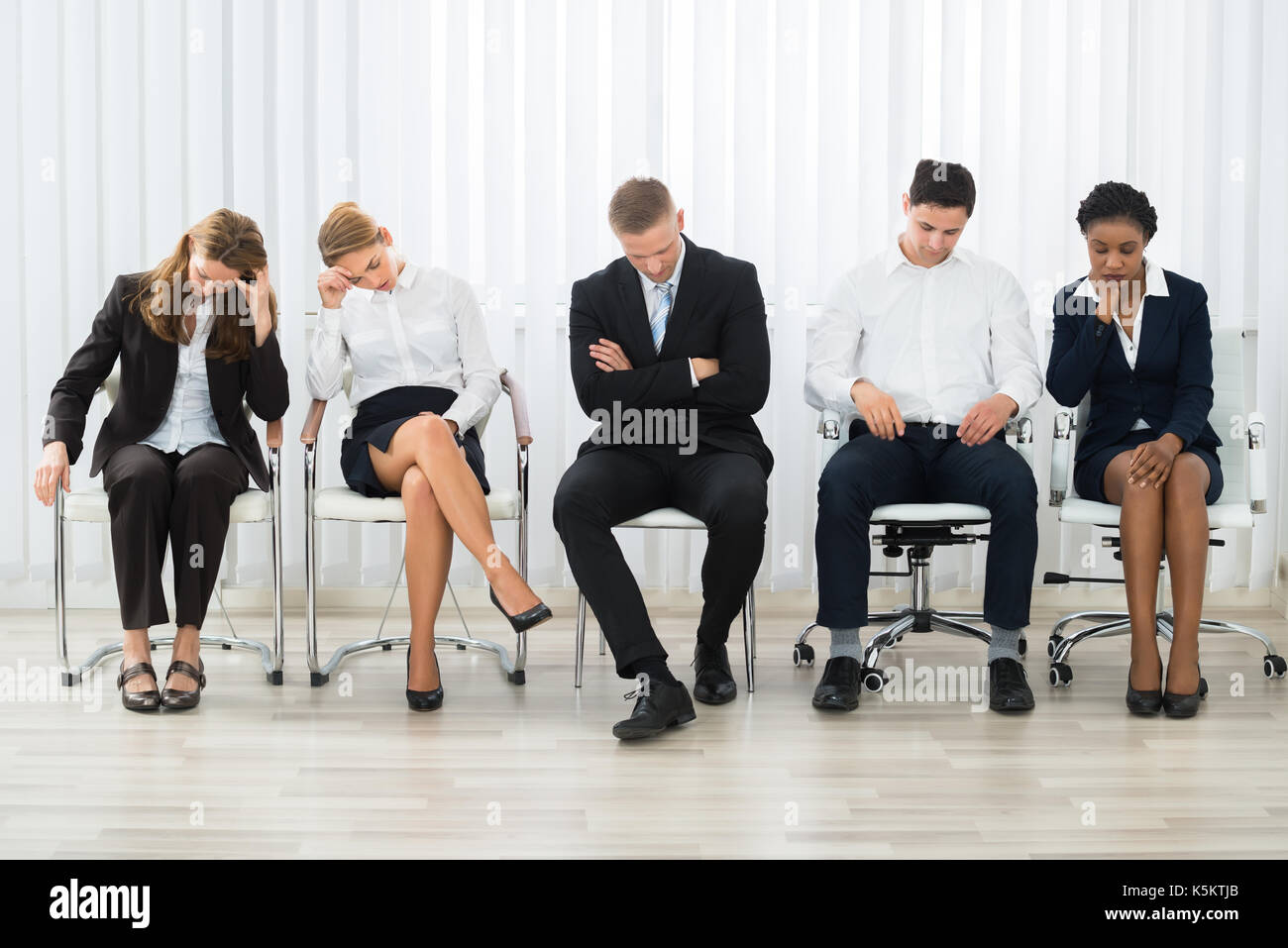 Man sleeping in chair woman hires stock photography and images Alamy