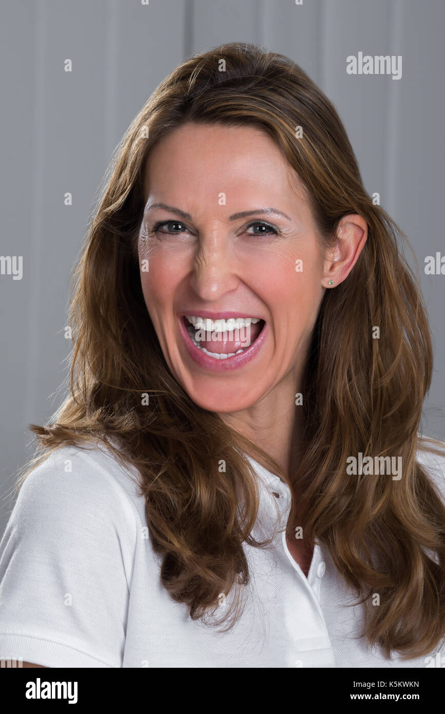 Portrait Photo Of Beautiful Mature Woman Laughing Stock Photo - Alamy