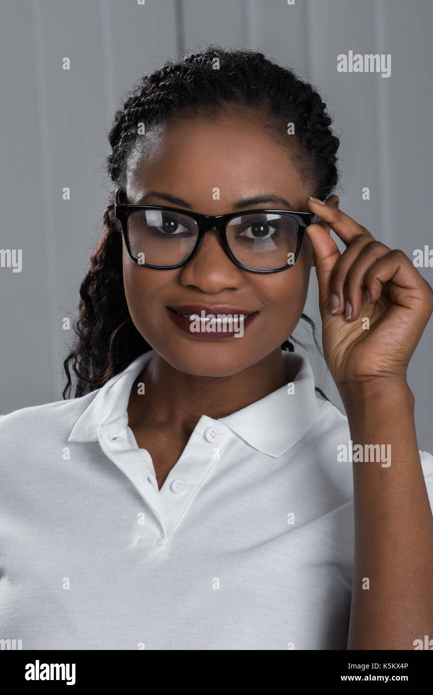 Beautiful young casual african woman hi-res stock photography and ...