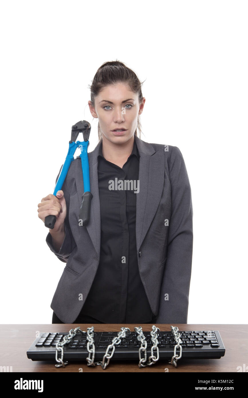 Computer keyboard locked up and business woman holding bolt cutters