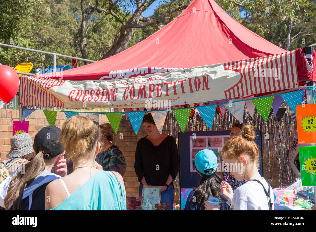 Guessing competition stall for traditional fun, at an Australian school fete fair in Sydney, NSW, Australia to raise funds for the school Stock Photo