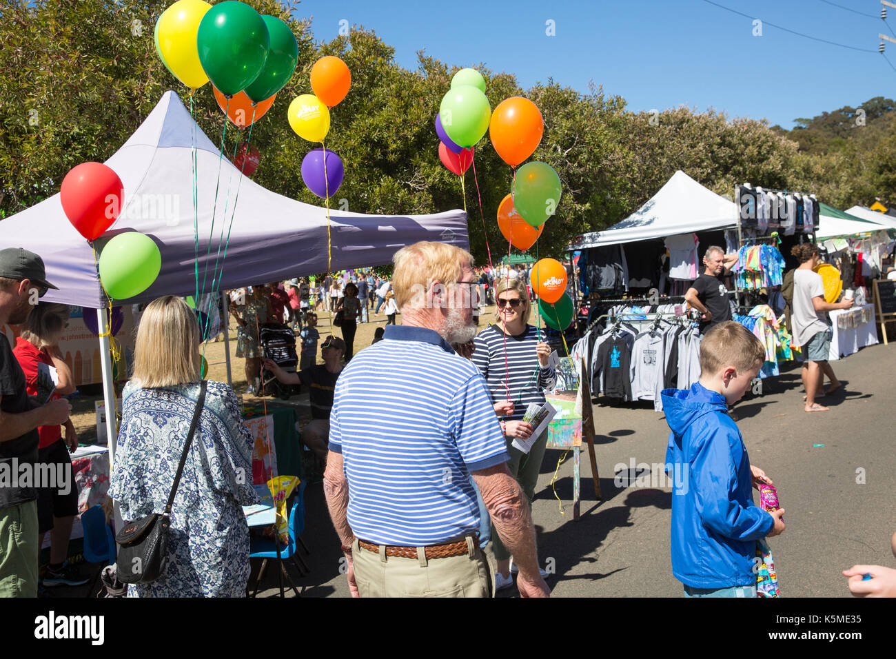 Australian school and community fete in Sydney, New South Wales, Australia with balloons above market stalls Stock Photo