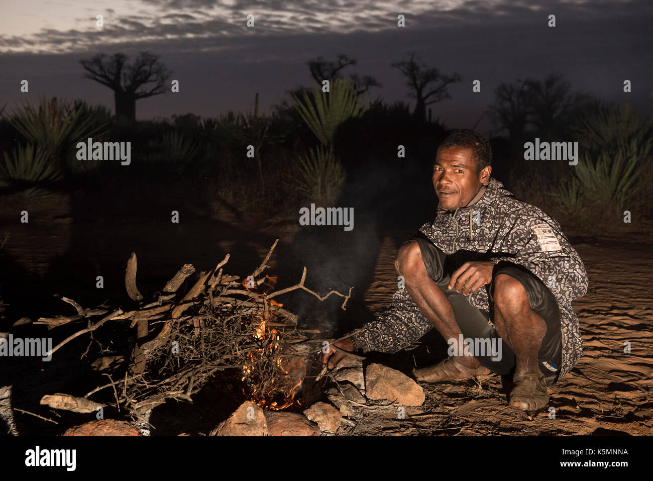 Antandroy man making a fire, Mandrare River Camp, Ifotaka Community Forest, Madagascar Stock Photo