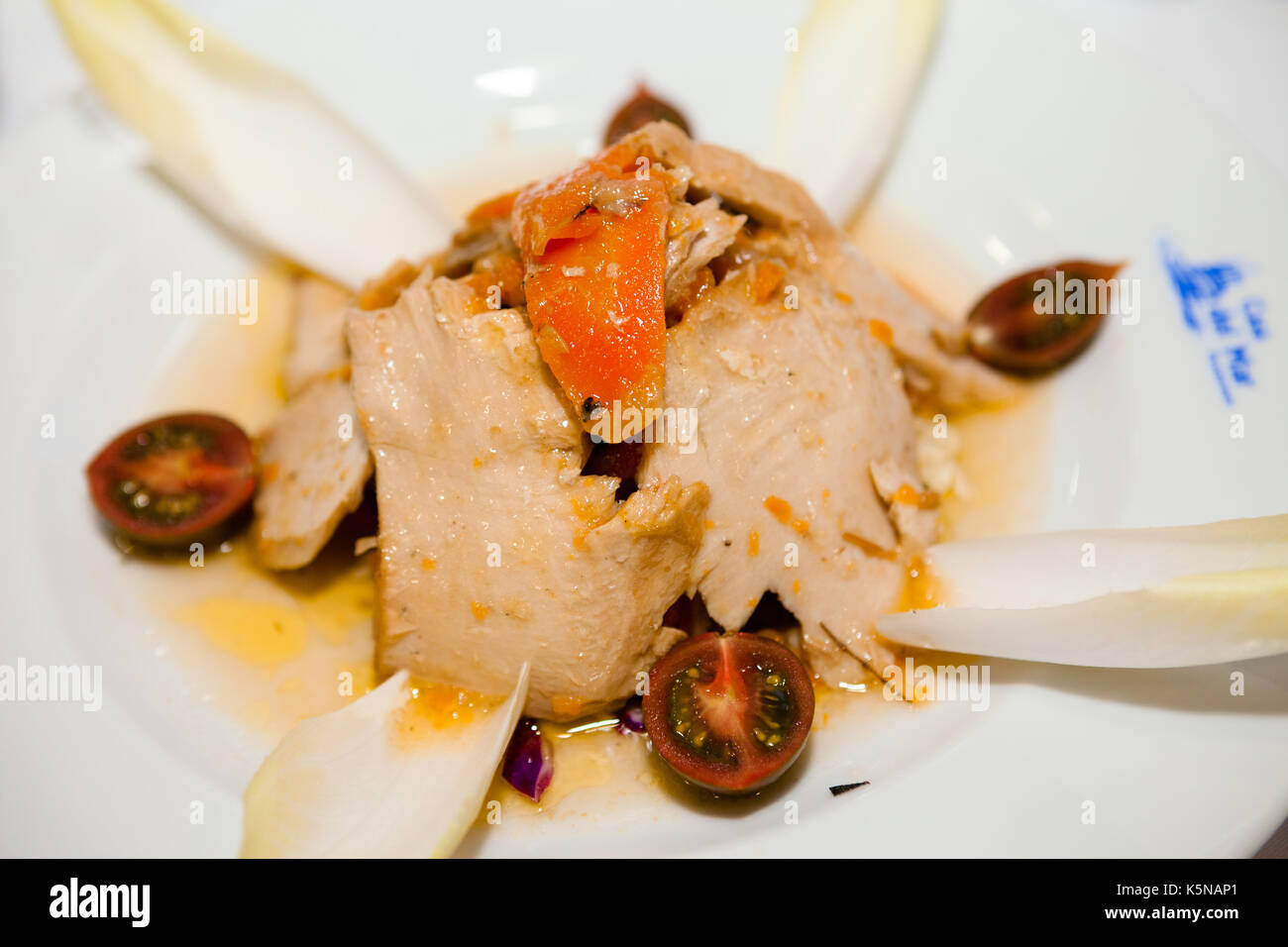 Tuna with tomatoes and carrot Stock Photo