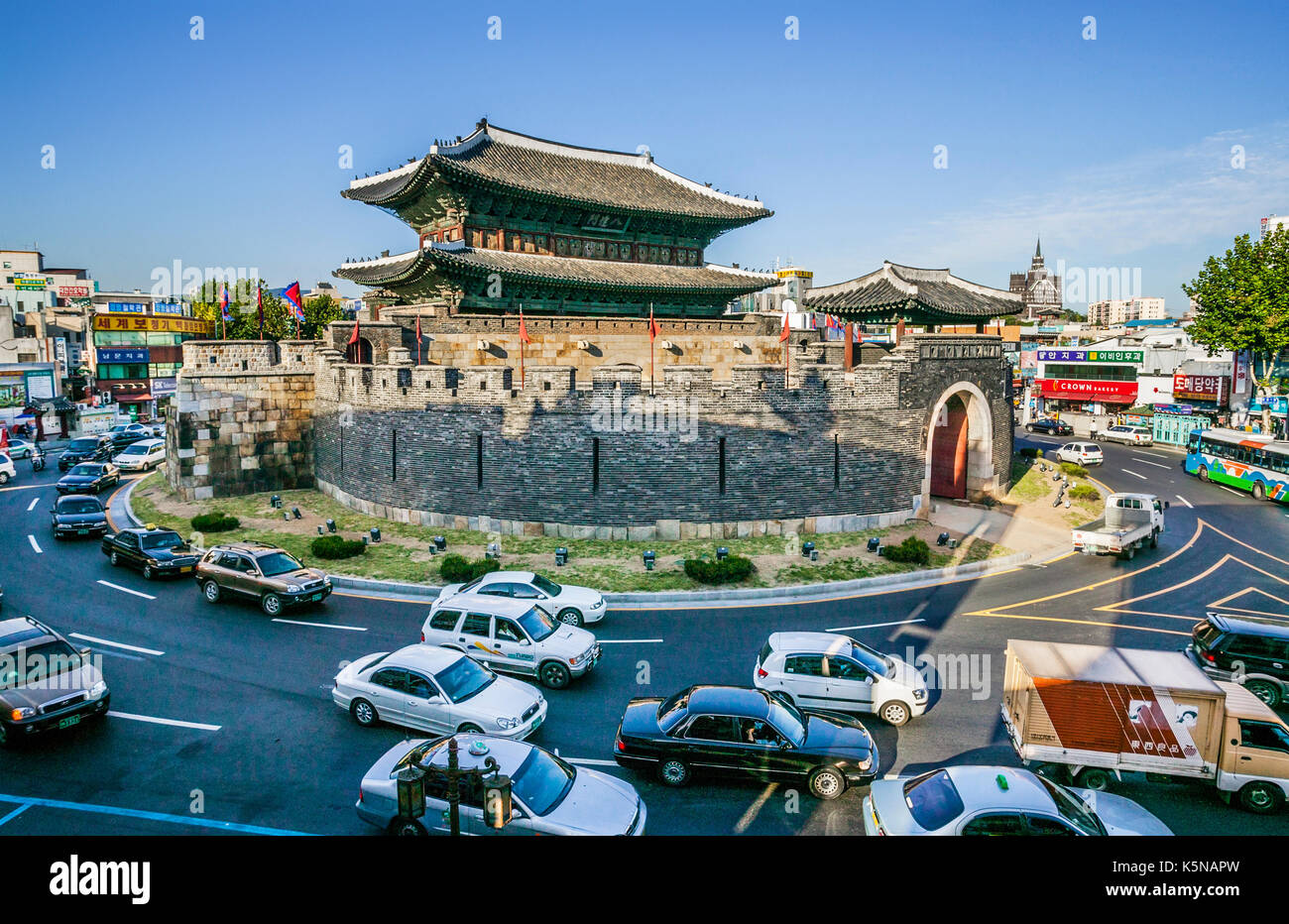 South Korea, Gyeonggi-do Province, Sudogwon, Suwon, view of Paldamun South Gate in the middle of a busy roundabout, forms part of the Hwaseong Fortres Stock Photo