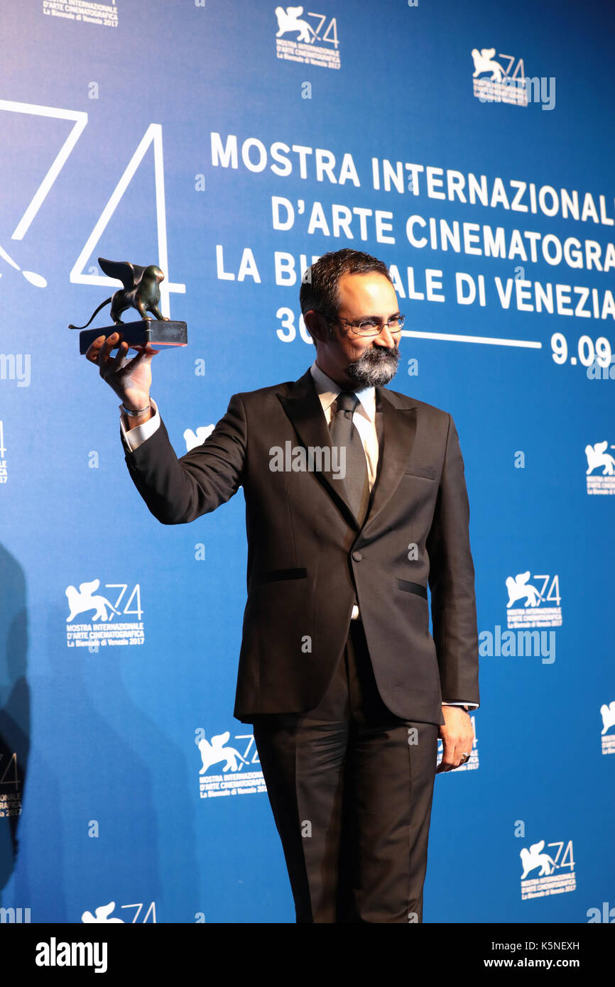 Venice, Italy. 09th Sep, 2017. Vahid Jalilvand poses with the Orizzonti Award for Best Director for 'Bedoone Tarikh, Bedoone Emza' at the Award Winners photocall during the 74th Venice Film Festival at Sala Casino on September 9, 2017 in Venice, Italy. ( Credit: Annalisa Flori/Media Punch)/Alamy Live News Stock Photo