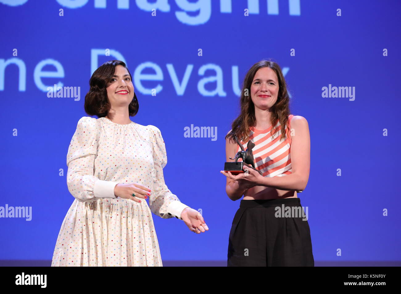 VENICE, ITALY - SEPTEMBER 09: Celine Devaux receives the Best Short Film for 'Gros Chagrin' during the Award Ceremony of the 74th Venice Film Festival at Sala Grande on September 9, 2017 in Venice, Italy. Stock Photo