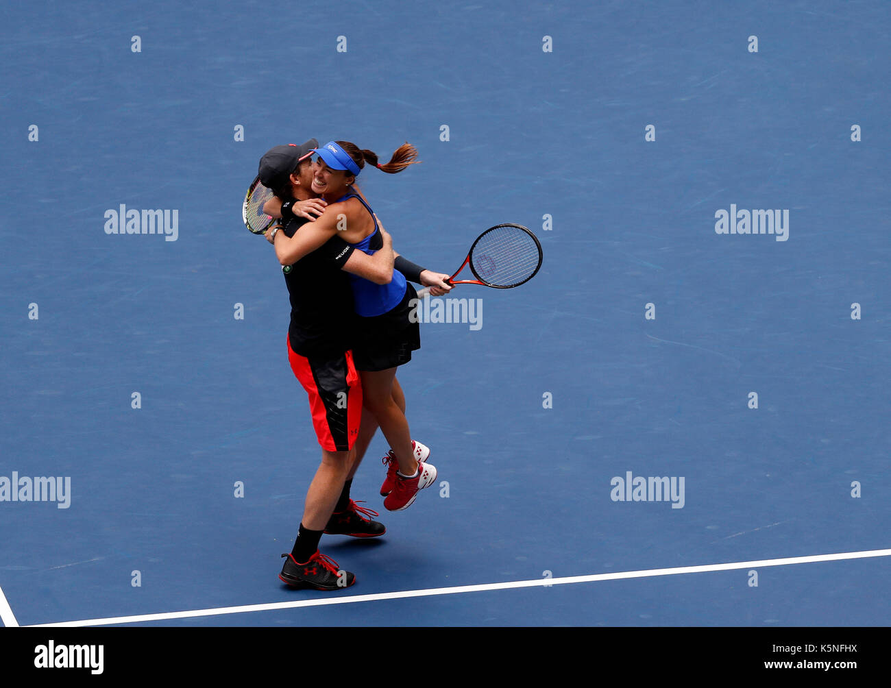 New York, USA. 9th Sep, 2017. Martina Hingis (R) of Switzerland and Jamie Murray of Great Britain celebrate after defeating Hao-Ching Chan of Chinese Taipei and Michael Venus of New Zealand during the mixed doubles final match at the 2017 US Open in New York, the United States, Sept. 9, 2017. Martina Hingis and Jamie Murray won 2-1 to claim the title. Credit: Qin Lang/Xinhua/Alamy Live News Stock Photo