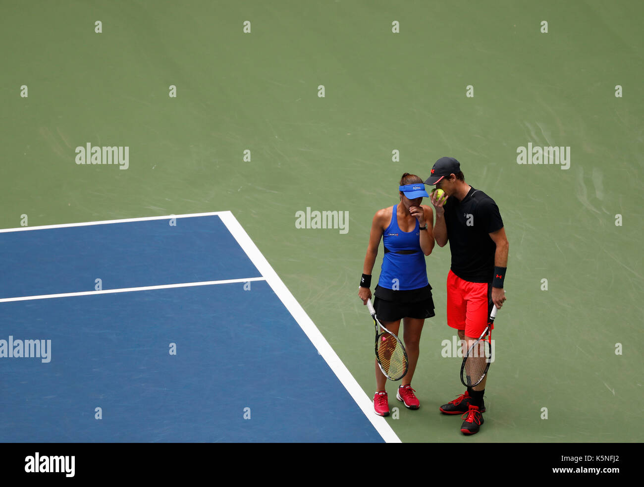 New York, USA. 9th Sep, 2017. Martina Hingis (L) of Switzerland talks to Jamie Murray of Great Britain during the mixed doubles final match against Hao-Ching Chan of Chinese Taipei and Michael Venus of New Zealand at the 2017 US Open in New York, the United States, Sept. 9, 2017. Martina Hingis and Jamie Murray won 2-1 to claim the title. Credit: Qin Lang/Xinhua/Alamy Live News Stock Photo