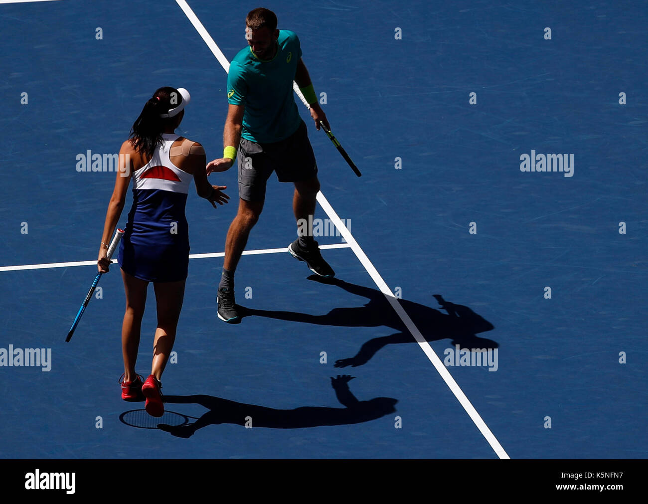 New York, USA. 9th Sep, 2017. Hao-Ching Chan (L) of Chinese Taipei and Michael Venus of New Zealand compete against Martina Hingis of Switzerland and Jamie Murray of Great Britain during the mixed doubles final match at the 2017 US Open in New York, the United States, Sept. 9, 2017. Martina Hingis and Jamie Murray won 2-1 to claim the title. Credit: Qin Lang/Xinhua/Alamy Live News Stock Photo