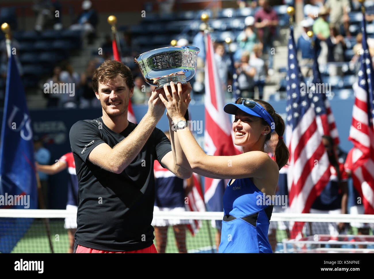 New York, USA. 9th Sep, 2017. Martina Hingis (R) of Switzerland and Jamie Murray of Great Britain attend the awarding ceremony after their mixed doubles final match against Hao-Ching Chan of Chinese Taipei and Michael Venus of New Zealand at the 2017 US Open in New York, the United States, Sept. 9, 2017. Martina Hingis and Jamie Murray won 2-1 to claim the title. Credit: Qin Lang/Xinhua/Alamy Live News Stock Photo