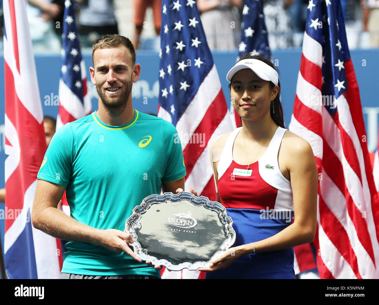 New York, USA. 9th Sep, 2017. Hao-Ching Chan (R) of Chinese Taipei and Michael Venus of New Zealand attend the awarding ceremony after their mixed doubles final match against Martina Hingis of Switzerland and Jamie Murray of Great Britain at the 2017 US Open in New York, the United States, Sept. 9, 2017. Martina Hingis and Jamie Murray won 2-1 to claim the title. Credit: Qin Lang/Xinhua/Alamy Live News Stock Photo