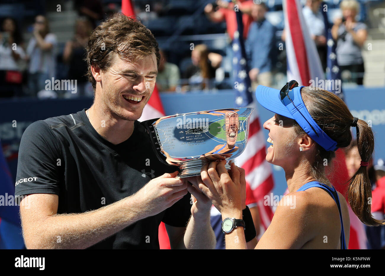 New York, USA. 9th Sep, 2017. Martina Hingis (R) of Switzerland and Jamie Murray of Great Britain attend the awarding ceremony after their mixed doubles final match against Hao-Ching Chan of Chinese Taipei and Michael Venus of New Zealand at the 2017 US Open in New York, the United States, Sept. 9, 2017. Martina Hingis and Jamie Murray won 2-1 to claim the title. Credit: Qin Lang/Xinhua/Alamy Live News Stock Photo