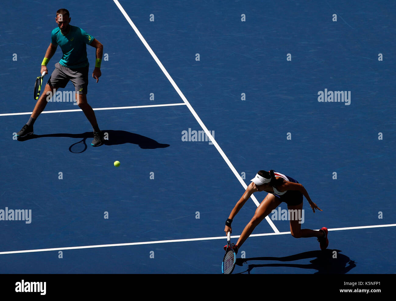 New York, USA. 9th Sep, 2017. Hao-Ching Chan (R) of Chinese Taipei and Michael Venus of New Zealand compete against Martina Hingis of Switzerland and Jamie Murray of Great Britain during the mixed doubles final match at the 2017 US Open in New York, the United States, Sept. 9, 2017. Martina Hingis and Jamie Murray won 2-1 to claim the title. Credit: Qin Lang/Xinhua/Alamy Live News Stock Photo