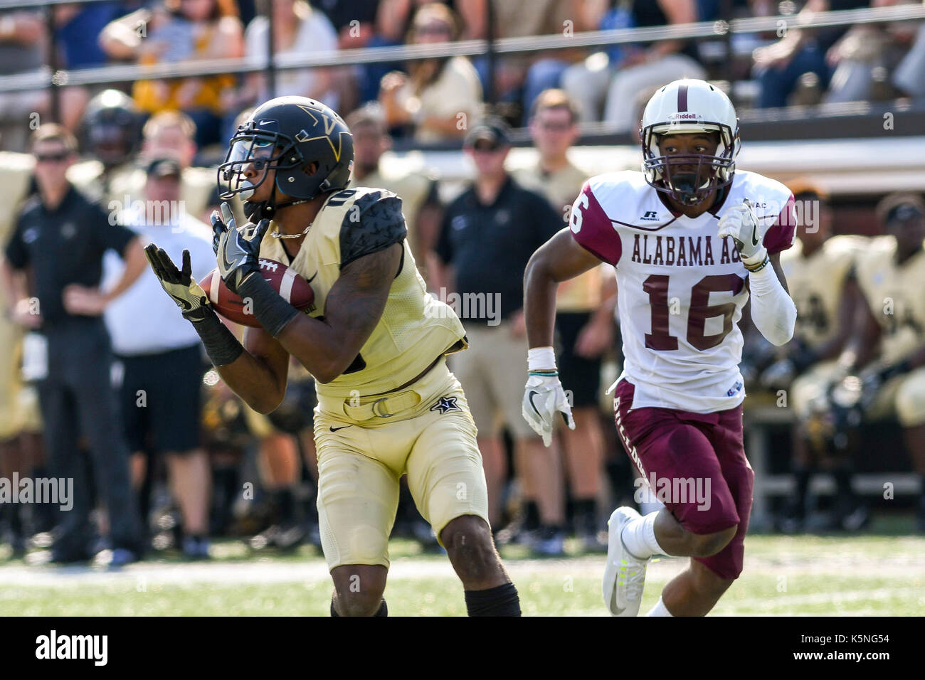 Nashville, TN, USA. 2nd Sep, 2017. Vanderbilt Commodores wide receiver Kalija Lipscomb (16) catchin a pass over Alabama A&M defensive back Tuwile Wilson #16 during a game between the Alabama A&M Bulldogs and the Vanderbilt Commodores at Vanderbilt Stadium in Nashville, TN. Thomas McEwen/CSM/Alamy Live News Stock Photo