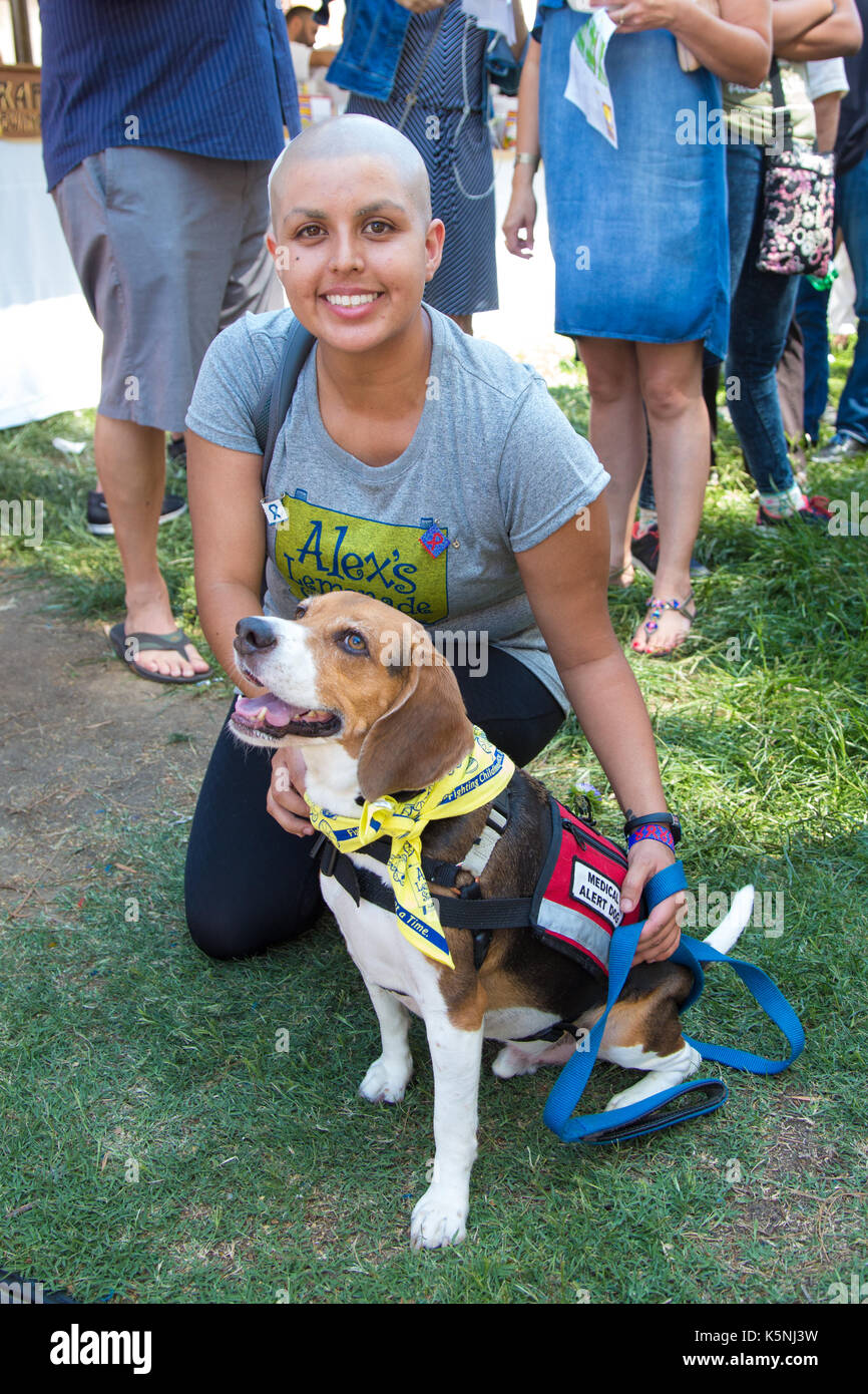 Los Angeles California, USA. 9th September, 2017.  Medical advocate and motivational speaker Gabriella Kasley with her dog 'Burrito' at the 8th Annual L.A. Loves Alex's Lemonade Fundraiser at the University of California, Los Angeles (UCLA) on September 9, 2017. Gabriella Kasley has been fighting cancer, Kaposi's sarcoma, and is an advocate for HIV/AIDS education and awareness.  Credit:  Sheri Determan/Alamy Live News Stock Photo
