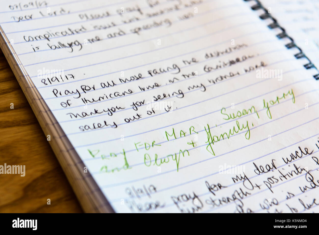 Belfast, Northern Ireland. 10/09/2017 - Prayers written on a book in a hospital chapel, one asking for prayers for the victims of Hurricane Irma. Stock Photo