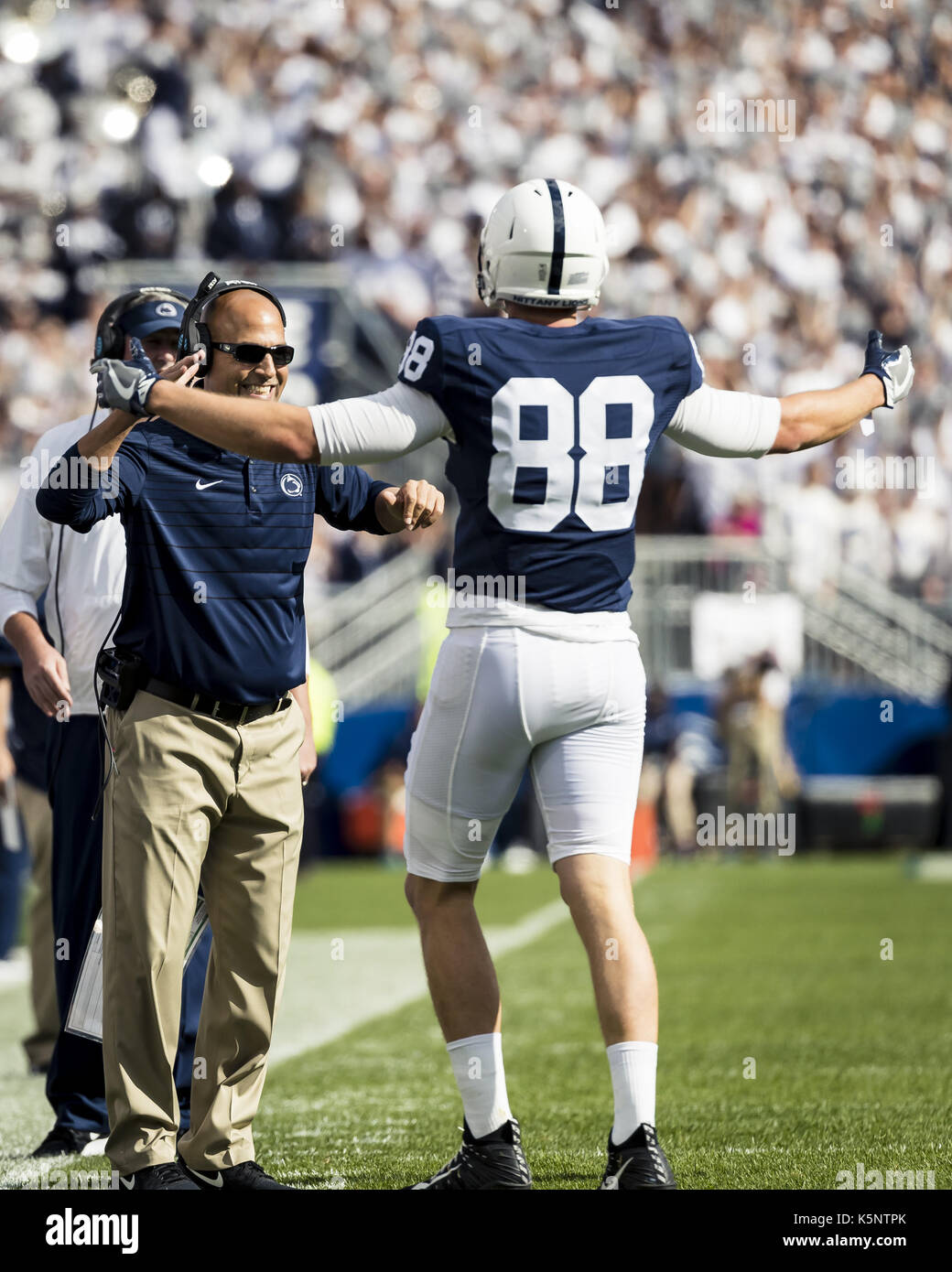 University Park, Pennsylvania, USA. 9th Sep, 2017. September 09, 2017: Penn State Nittany Lions tight end Mike Gesicki (88) celebrates a touchdown with Penn State Nittany Lions head coach James Franklin during the NCAA football game between the Pittsburgh Panthers and the Penn State Nittany Lions at Beaver Stadium in University Park, Pennsylvania. Credit: Scott Taetsch/ZUMA Wire/Alamy Live News Stock Photo