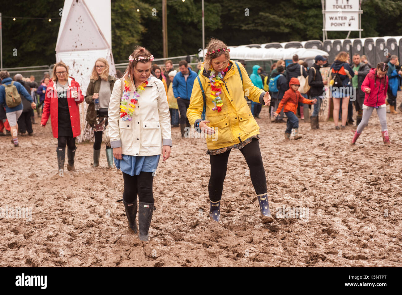 Portmeirion, Wales, UK. 10th September, 2017. Festival goers  brave the muddy conditions at Festival Number 6, Portmeirion, Wales 10th September, 2017. Credit: Ken Harrison/Alamy Live News Stock Photo
