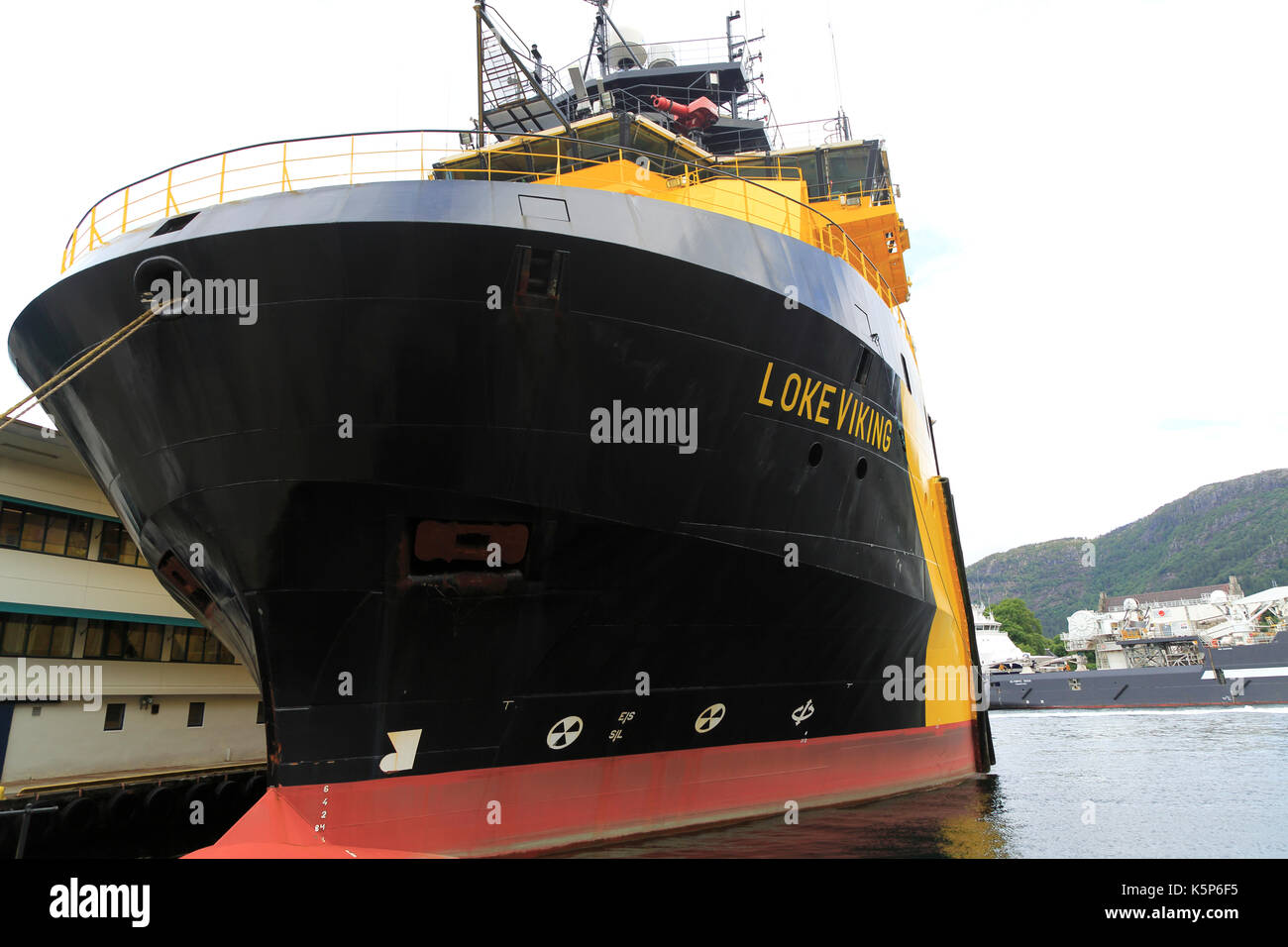 Loke Viking anchor handling tug ship in  the harbour at  Bergen, Norway Stock Photo