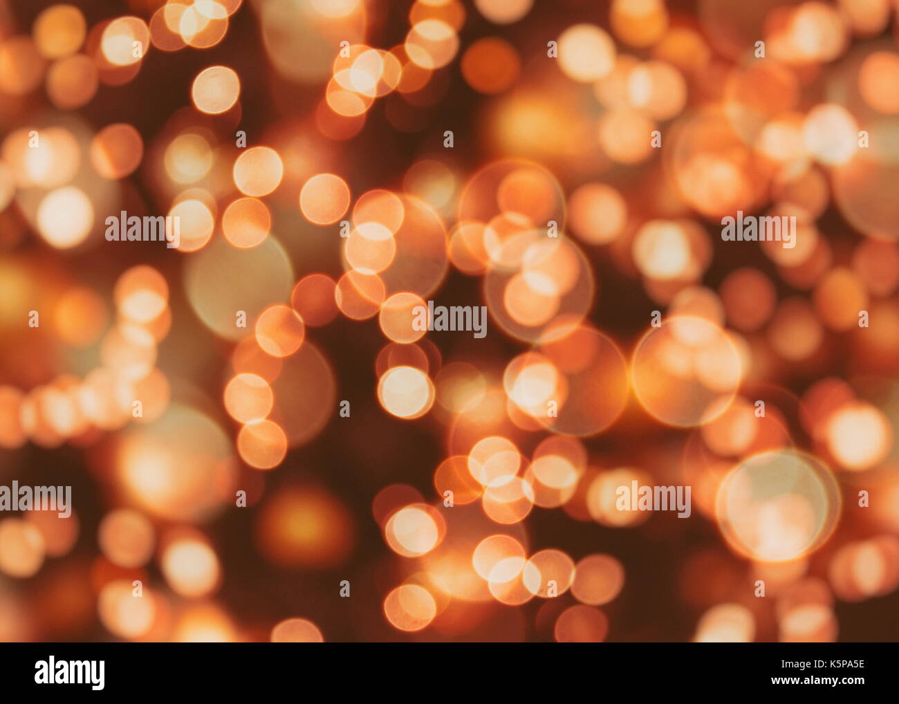 Festive background with natural bokeh and bright golden lights. Vintage ...