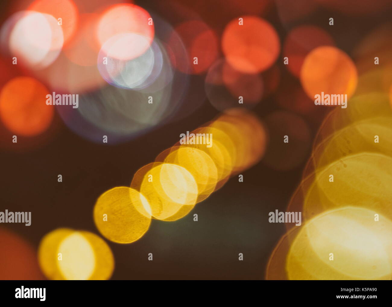 Festive background with natural bokeh and bright golden lights. Vintage ...
