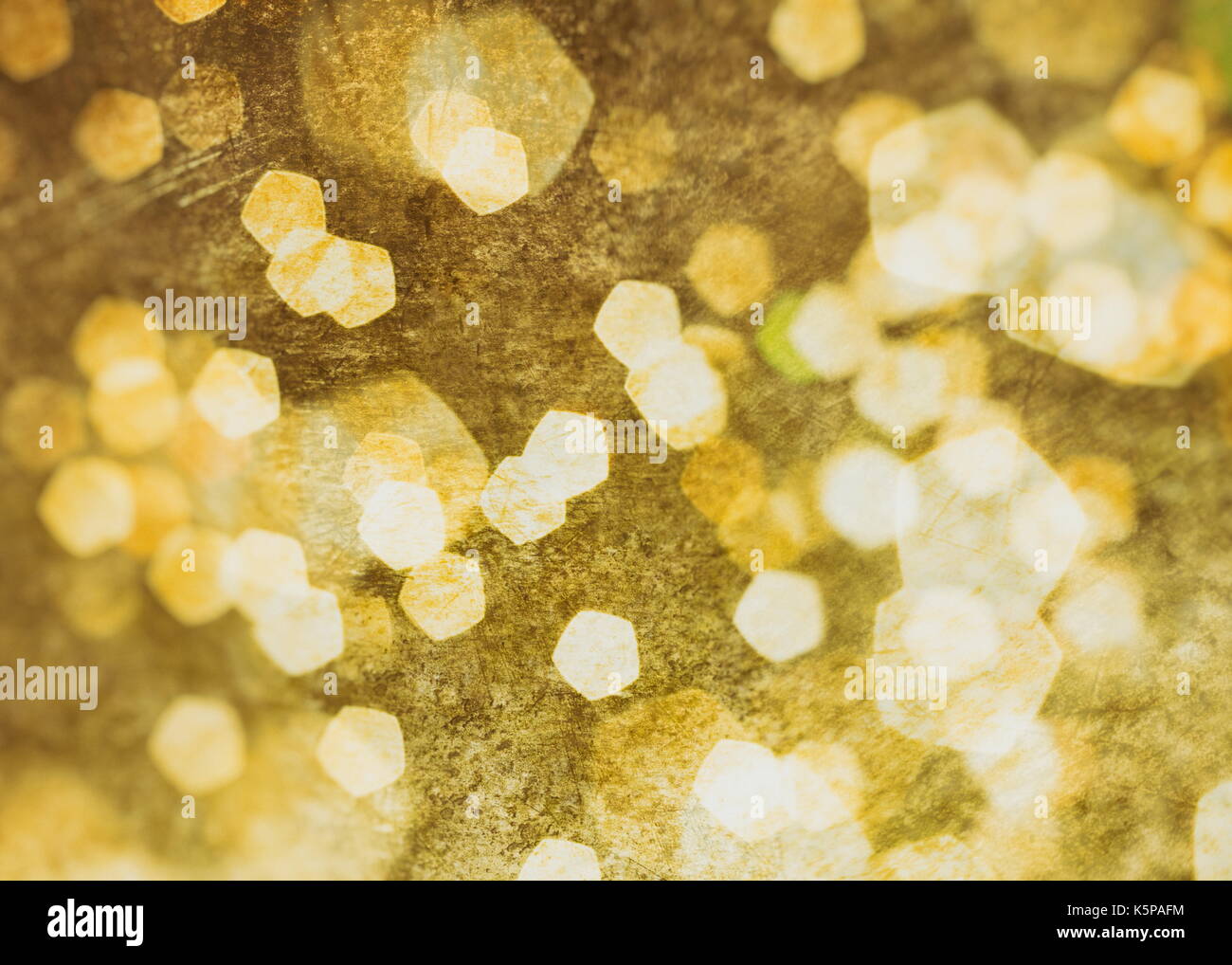Festive background with natural bokeh and bright golden lights. Vintage ...