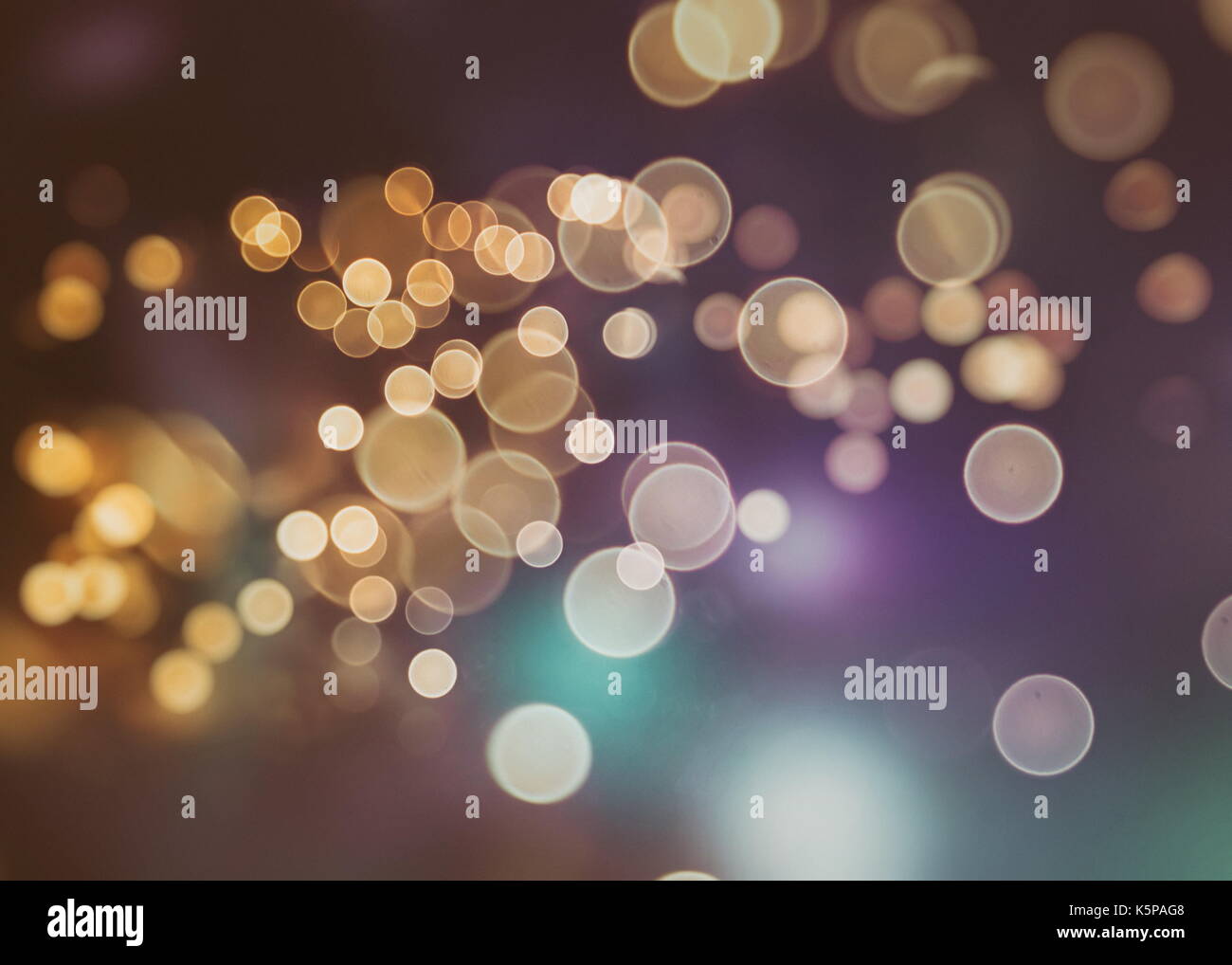 Festive background with natural bokeh and bright golden lights. Vintage ...