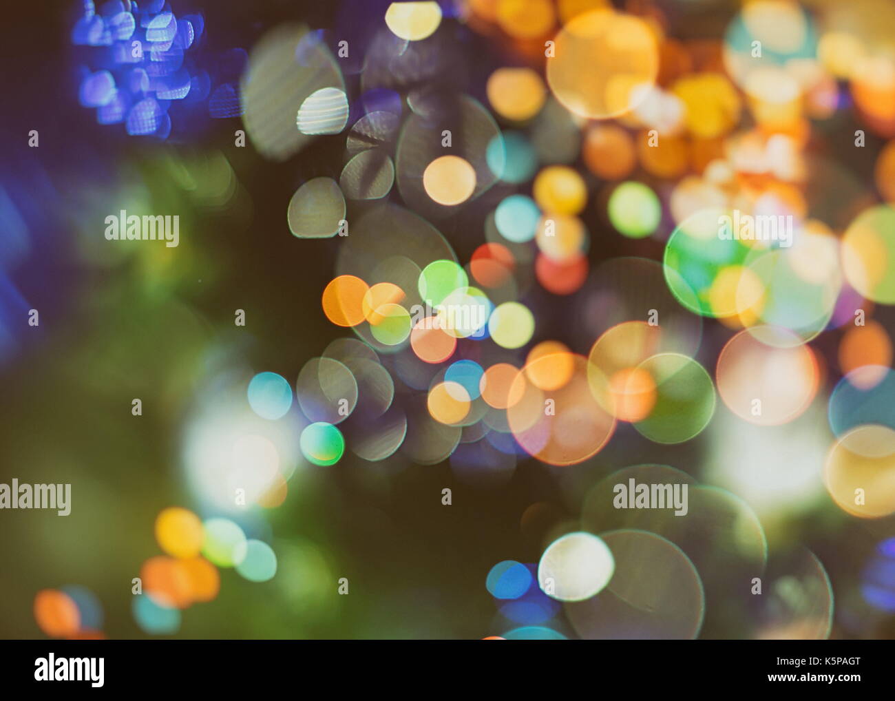 Festive background with natural bokeh and bright golden lights. Vintage ...