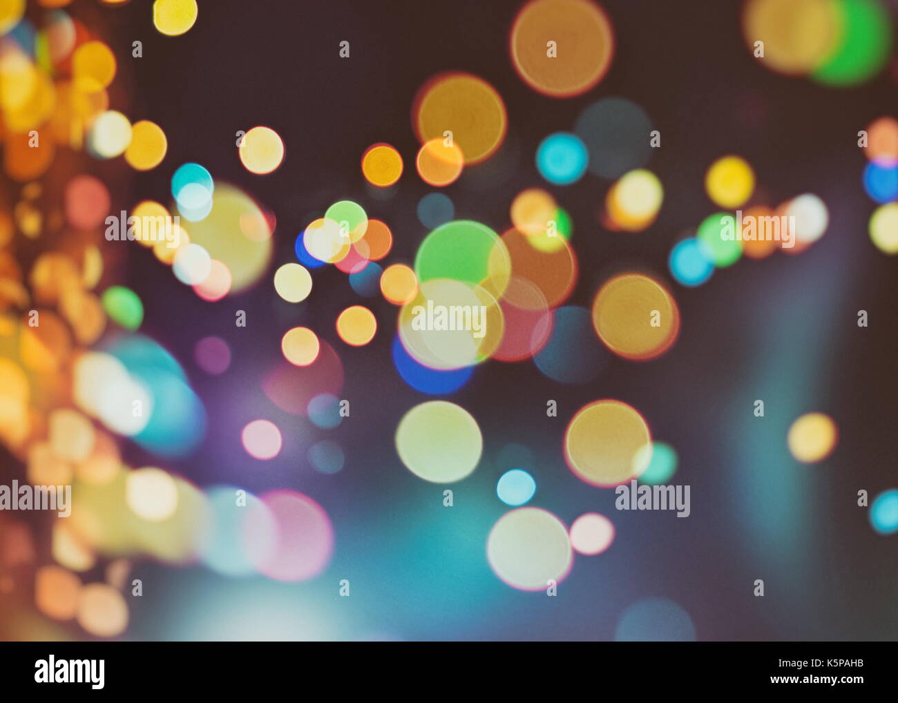 Festive background with natural bokeh and bright golden lights. Vintage ...