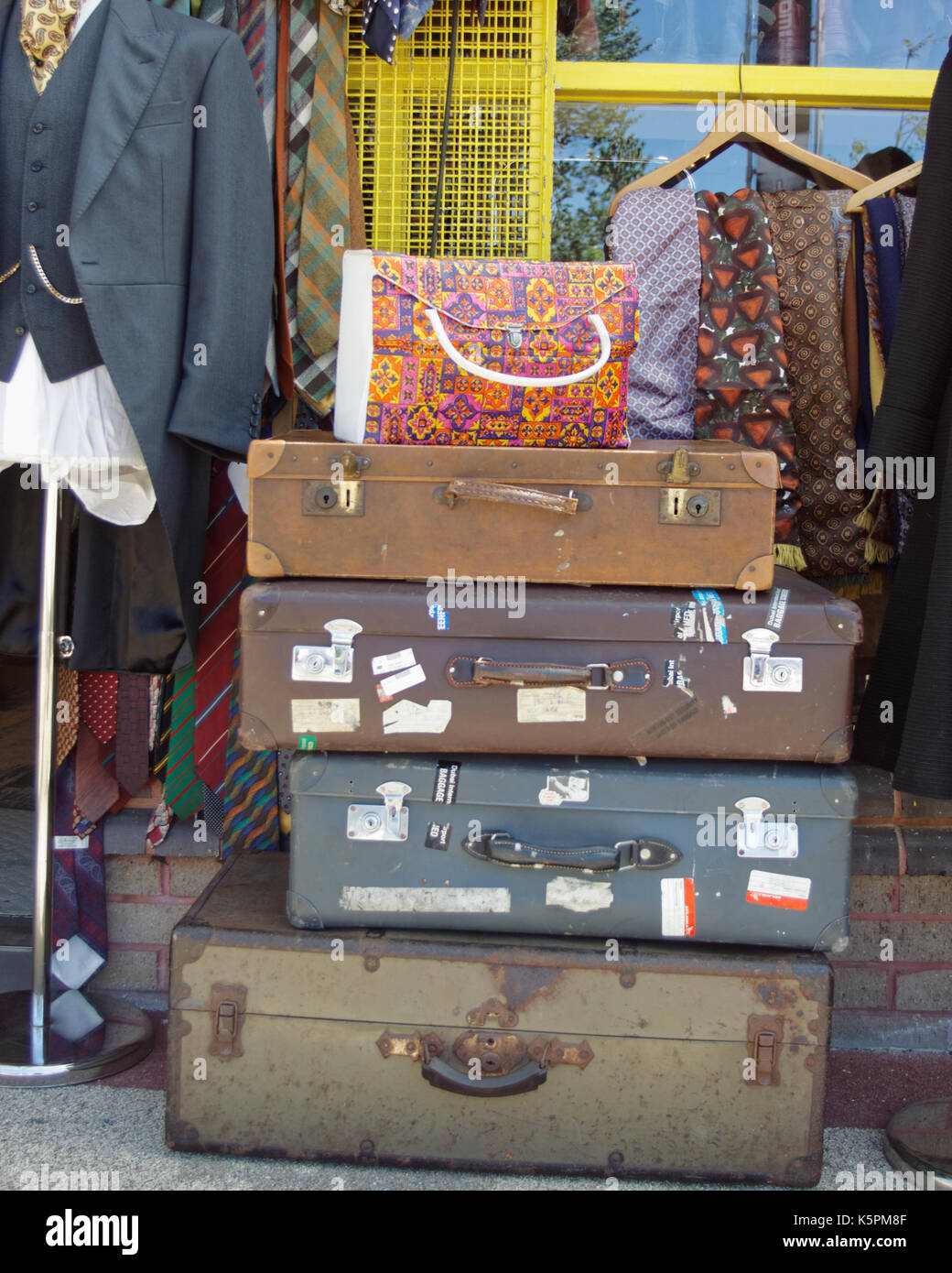 old vintage suitcases antique shop bric a brac Stock Photo