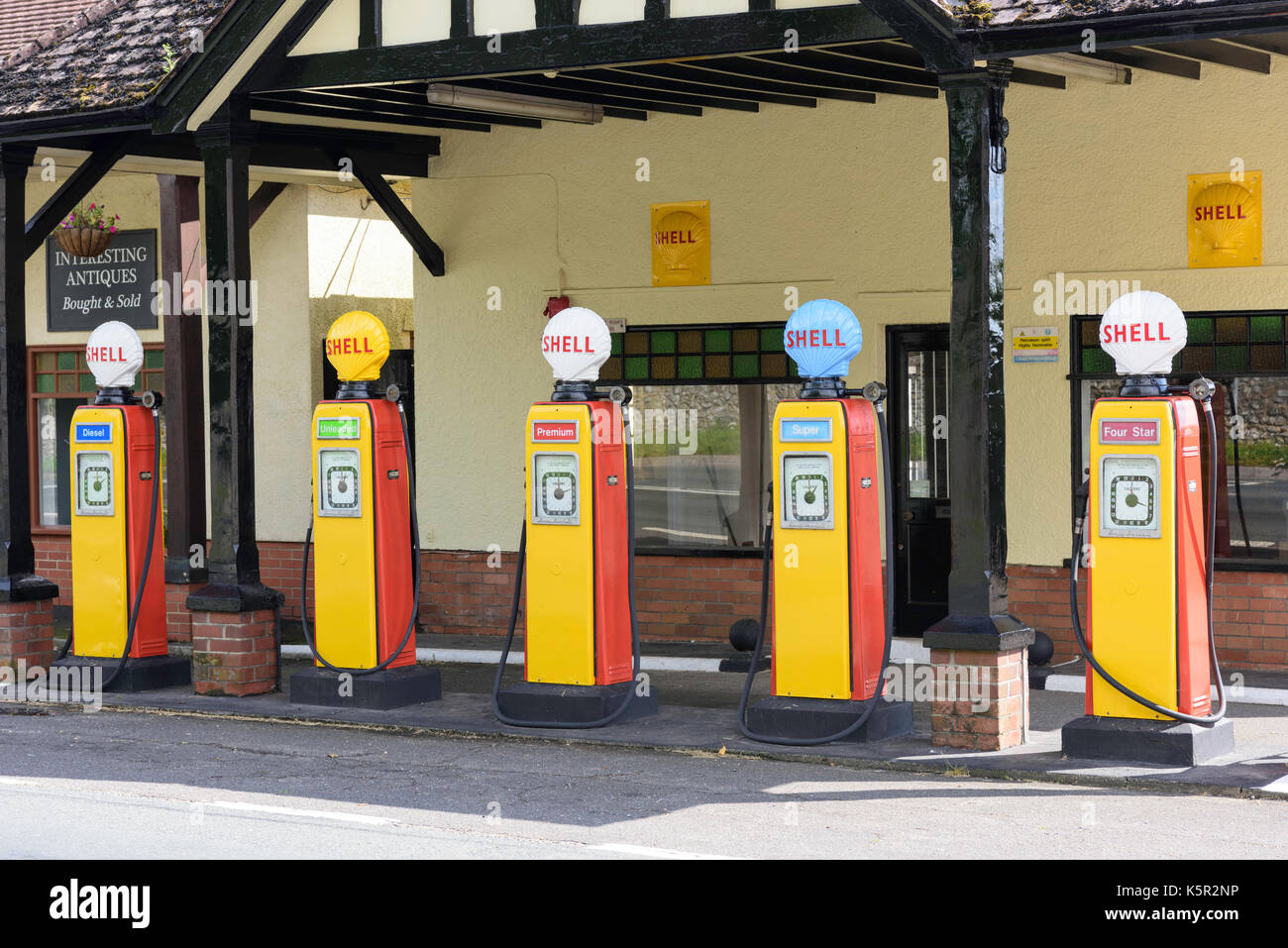 Vintage Shell petrol pumps Colyford east Devon UK Stock Photo