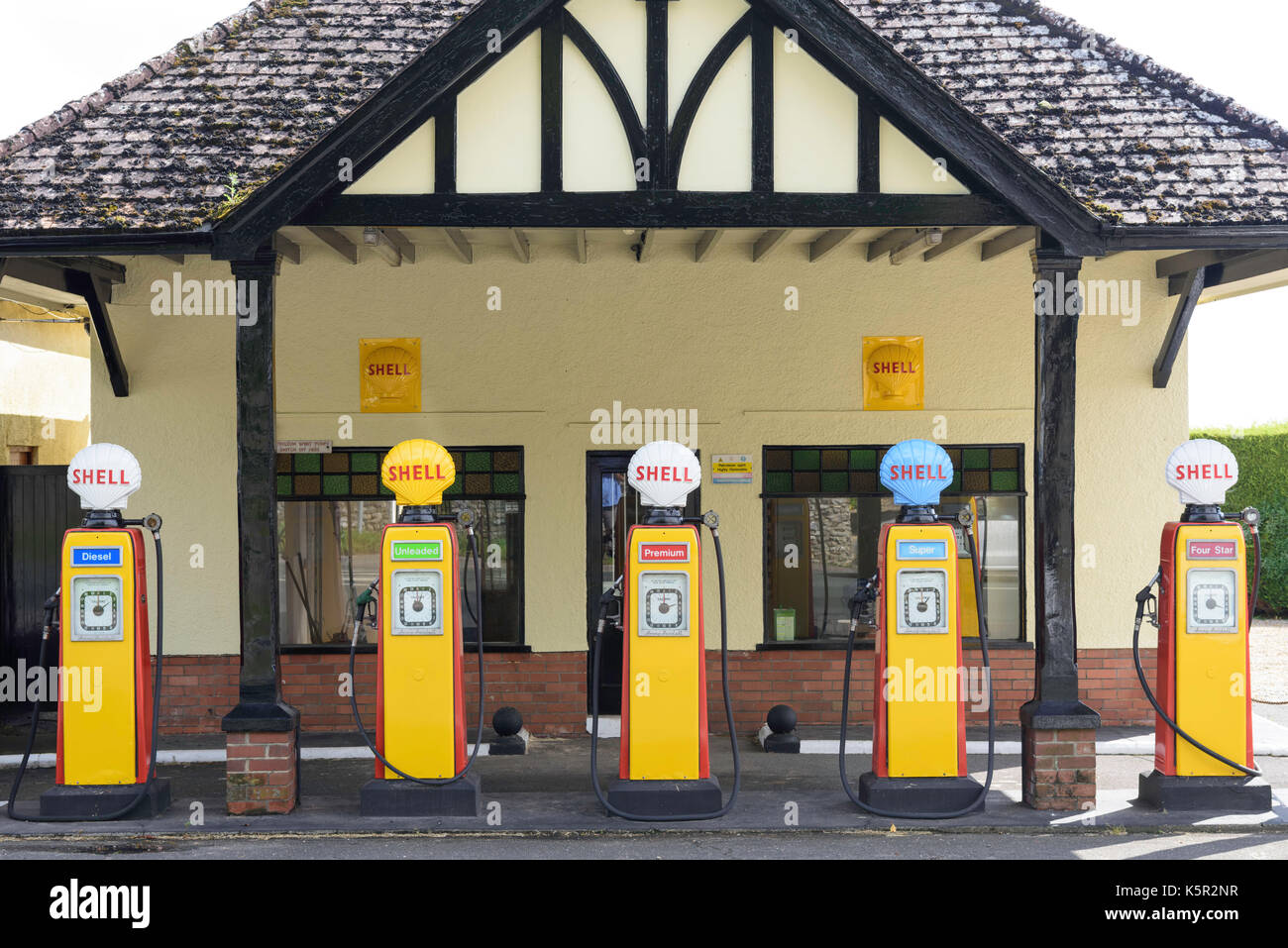 Vintage Shell petrol pumps Colyford east Devon UK Stock Photo