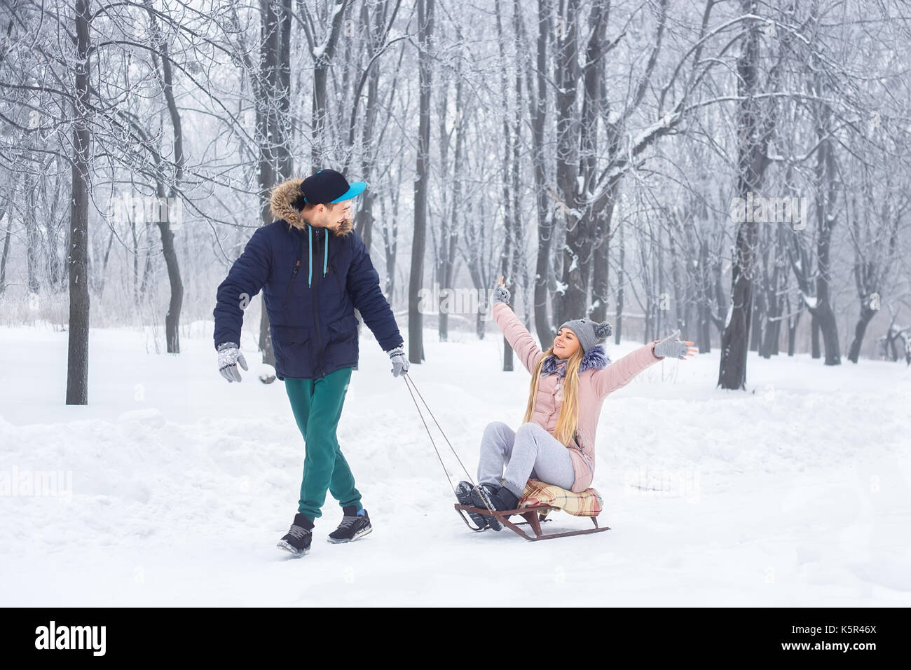 sledding on sled Stock Photo