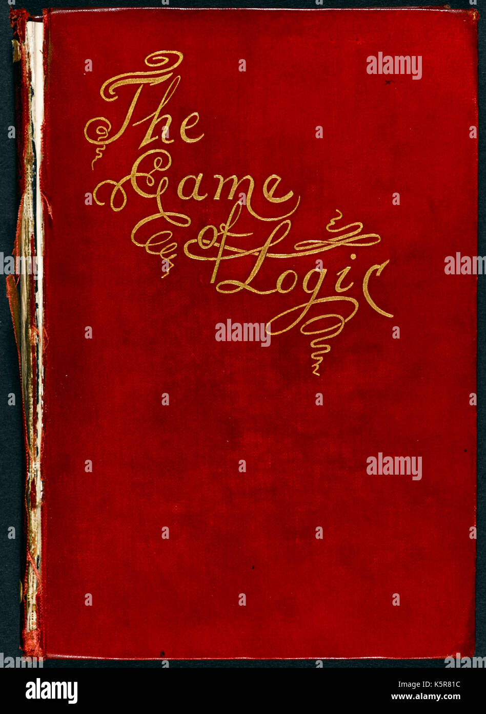 ‘The Game of Logic’ by Lewis Caroll, the pseudonym of Charles Lutwidge Dodgson (1832-1898) in 1887. Dodgson was a mathematician and this game challenged ‘players’ to denote various logical statements. Photograph of first edition front cover. See more information below. Stock Photo